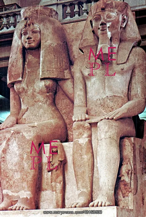 : Menkaura flanked by the goddess Hathor (left) : Menkaura flanked by the goddess Hathor (left)