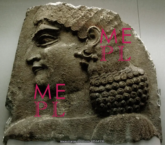 : Mesopotamian Art. Assyrian. Relief. Head of a eunuch. Dated : Mesopotamian Art. Assyrian. Relief. Head of a eunuch. Dated