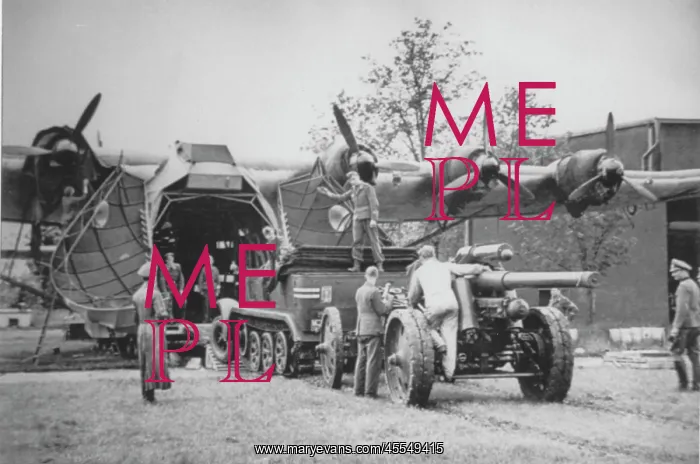 : Messerschmitt Me 323D -1 loading artillary : Messerschmitt Me 323D -1 loading artillary