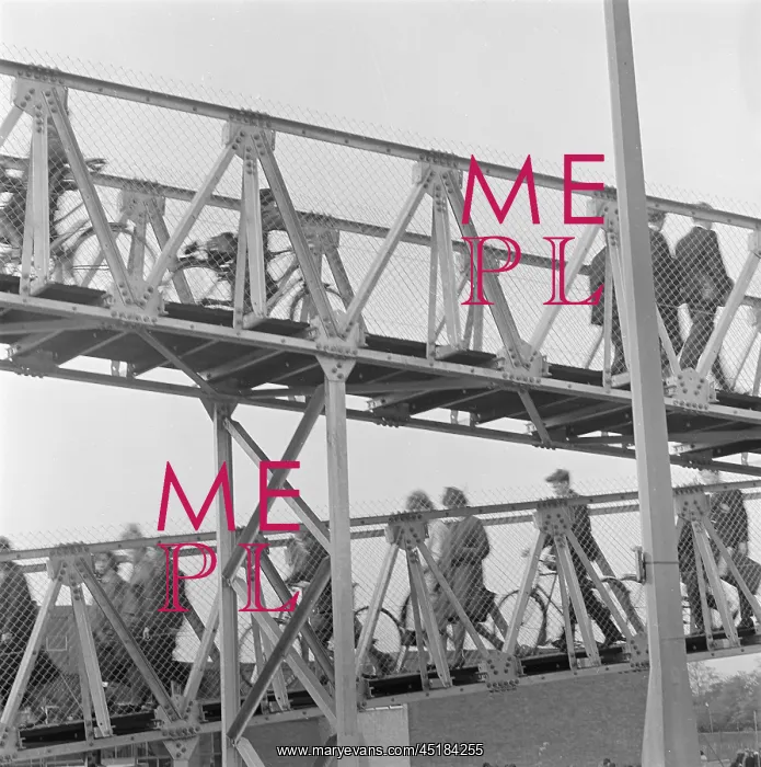 : Metal Bridge With Cyclists : Metal Bridge With Cyclists