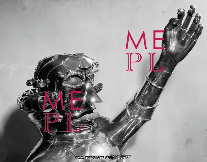 : Metal robot head and chest with one arm raised : Metal robot head and chest with one arm raised