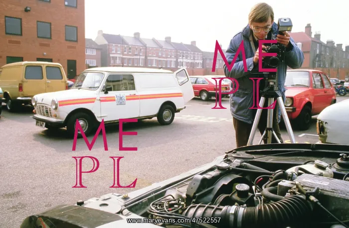 : Metropolitan Police photographer at work : Metropolitan Police photographer at work