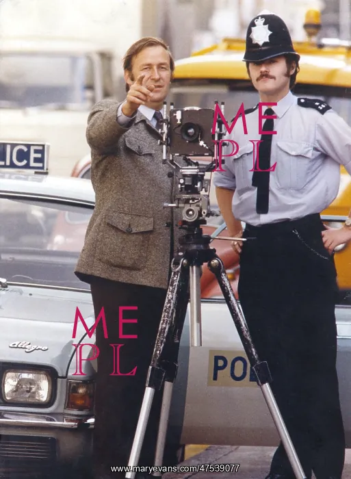 : Metropolitan police photographer at work : Metropolitan police photographer at work
