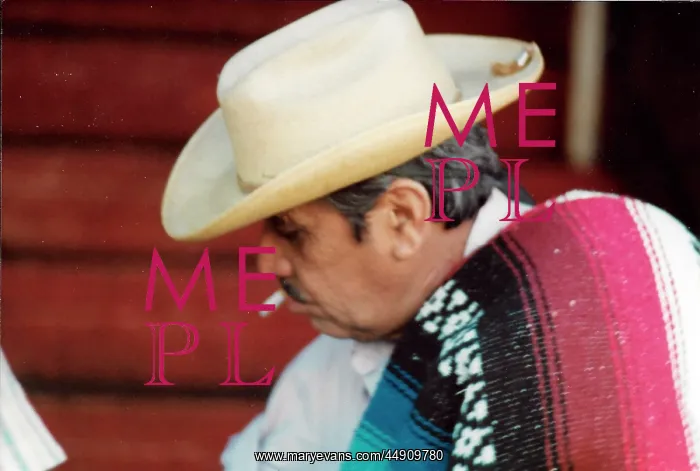 : Mexican man with cigarette and hat : Mexican man with cigarette and hat