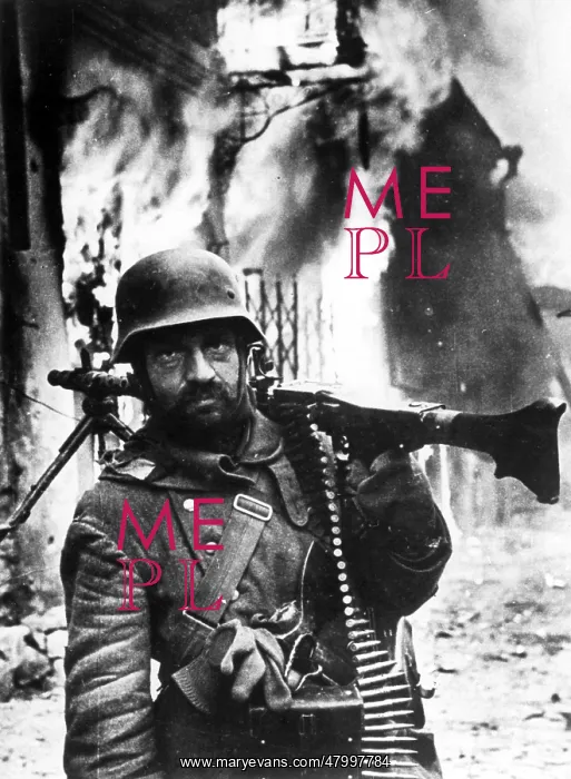 : An MG gunner with an MG 234 in the middle of Shitomir : An MG gunner with an MG 234 in the middle of Shitomir