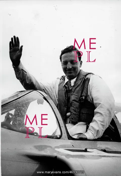 : Michael Lithgow waving from his plane : Michael Lithgow waving from his plane