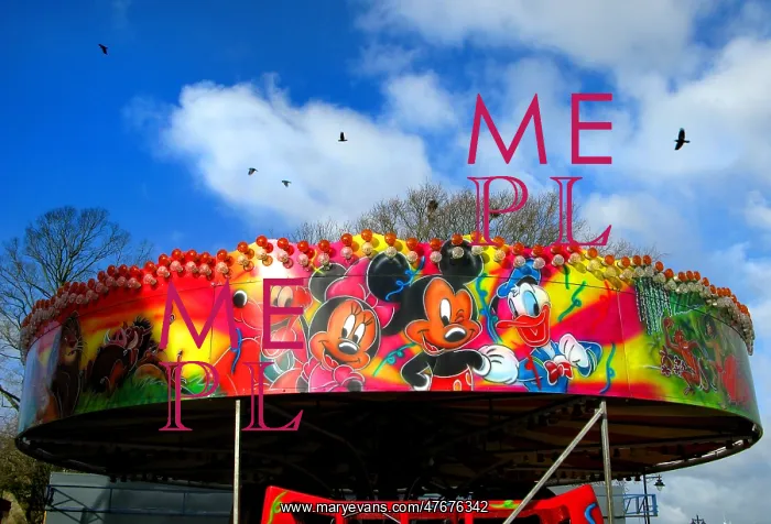  : Mickey Mouse characters on a fairground roundabout