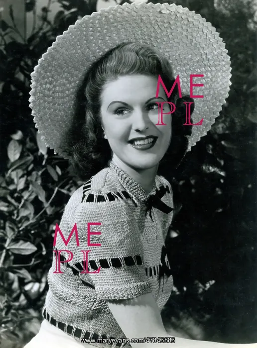 : Mid-1940s model with wide-brimmed straw hat : Mid-1940s model with wide-brimmed straw hat