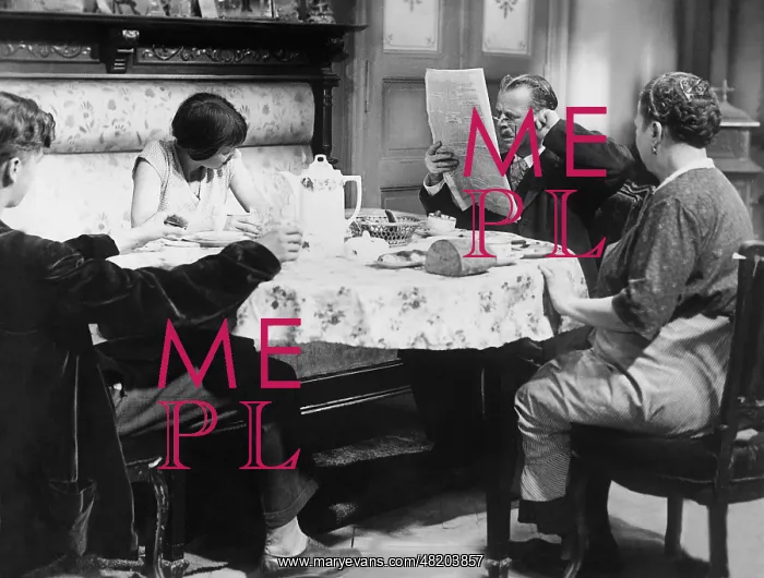 : Middle class family eating breakfast, 1931 : Middle class family eating breakfast, 1931