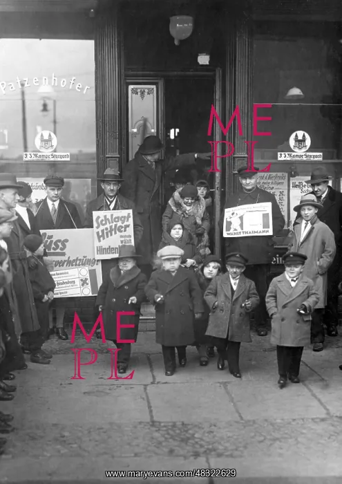 : Midgets leaving the polling station, 1932 : Midgets leaving the polling station, 1932