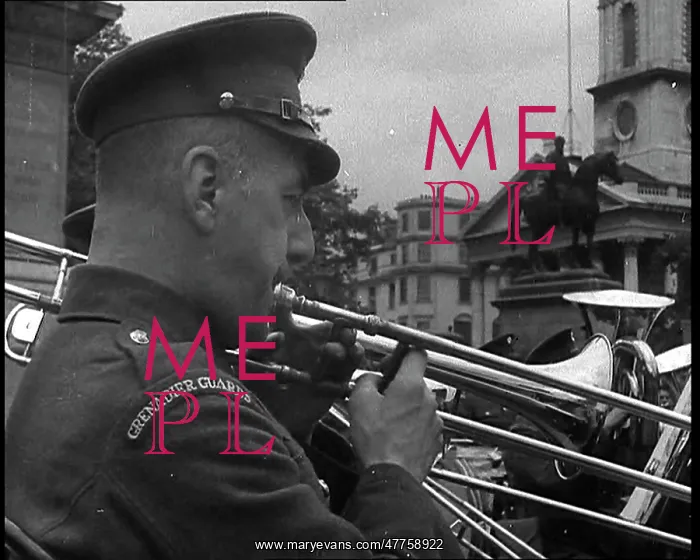 : A Military Band Member Playing the Trombone : A Military Band Member Playing the Trombone
