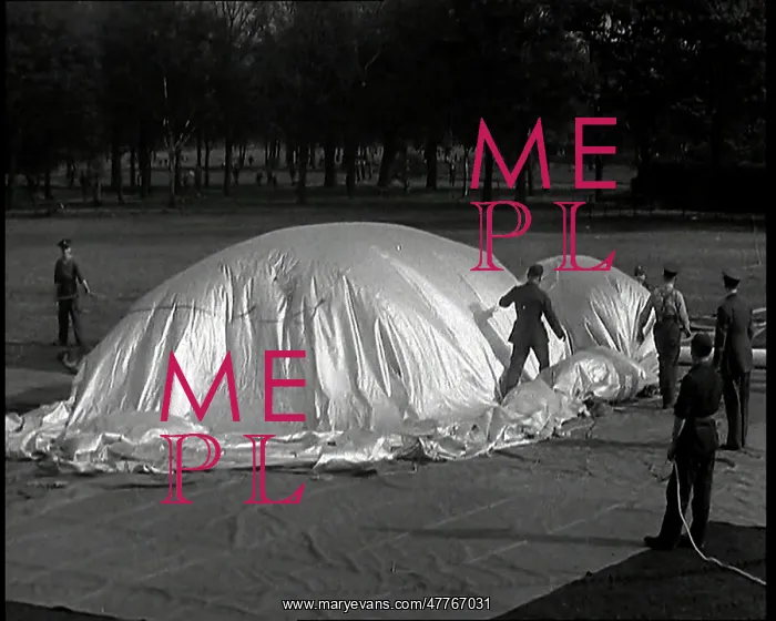 : Military Men Inflating a Barrage Balloon on : Military Men Inflating a Barrage Balloon on