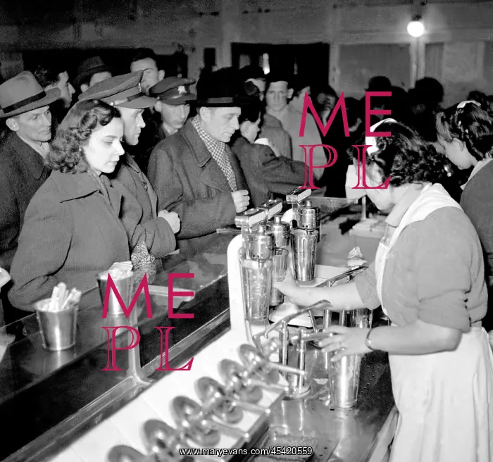  : Milk bar. Prague - Czechoslovakia, 1950. Customers at milk bar. CTK Vintage Photo