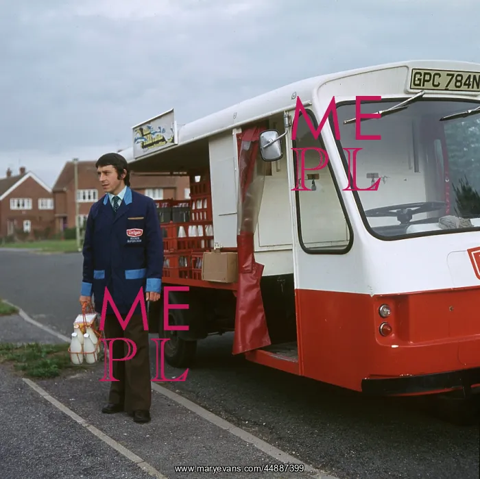 : Milkman delivering milk : Milkman delivering milk