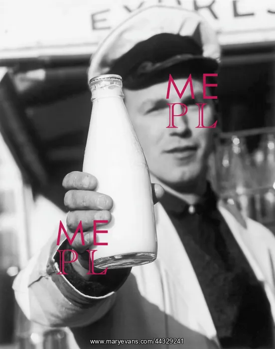  : MILKMAN HOLDS BOTTLE