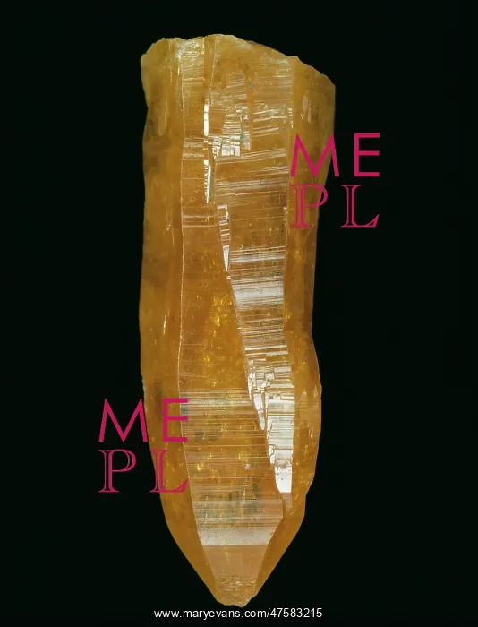 : Mimetite. A tall, orange prismatic crystal of mimetite : Mimetite. A tall, orange prismatic crystal of mimetite