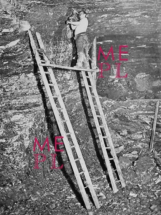 : Miner working a high seam Victorian period : Miner working a high seam Victorian period