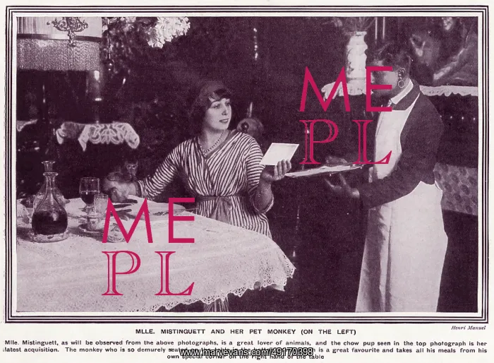 : Mistinguett dining with her pet monkey : Mistinguett dining with her pet monkey