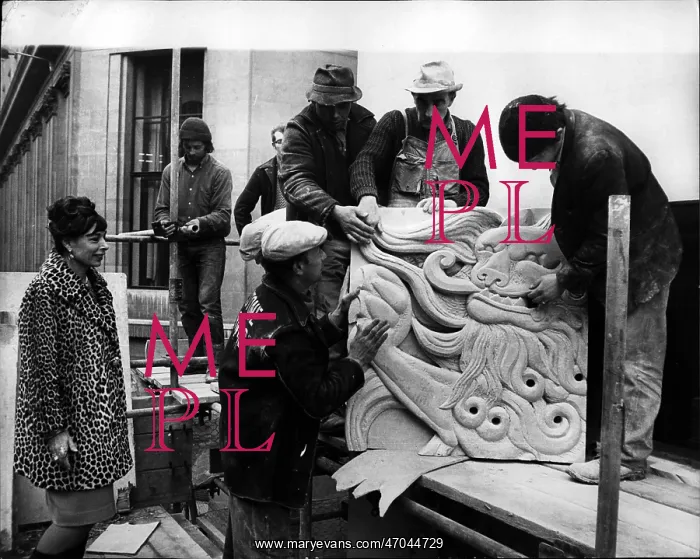 : Mitzi Cunliffe, sculptor, sees motifs placed in position : Mitzi Cunliffe, sculptor, sees motifs placed in position
