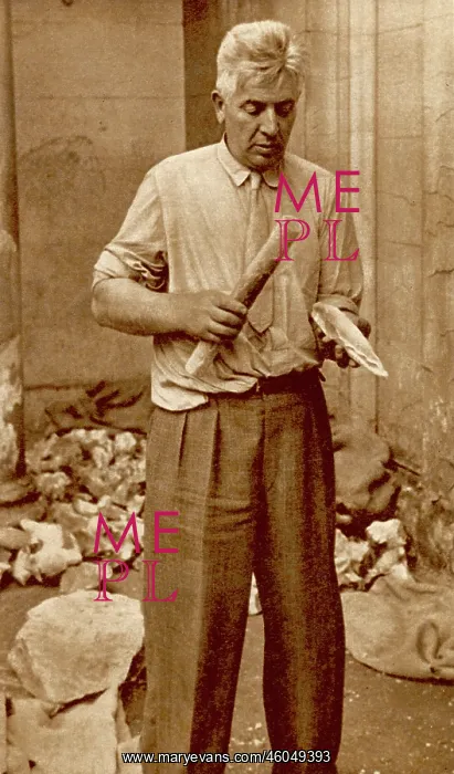 : M.Leon Coutier finishing a hand-axe of Acheulean type : M.Leon Coutier finishing a hand-axe of Acheulean type