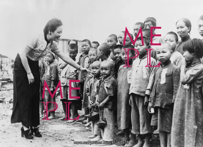  : Mme. Chiang Kai Shek with orphans she adopted after