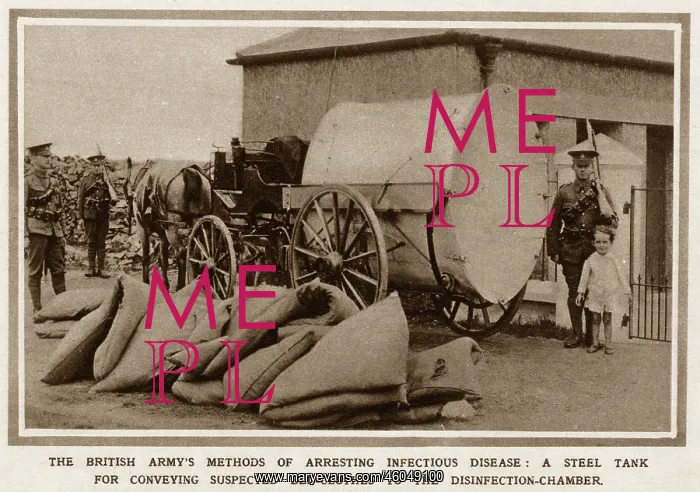  : A mobile, military washing machine being guarded by troops