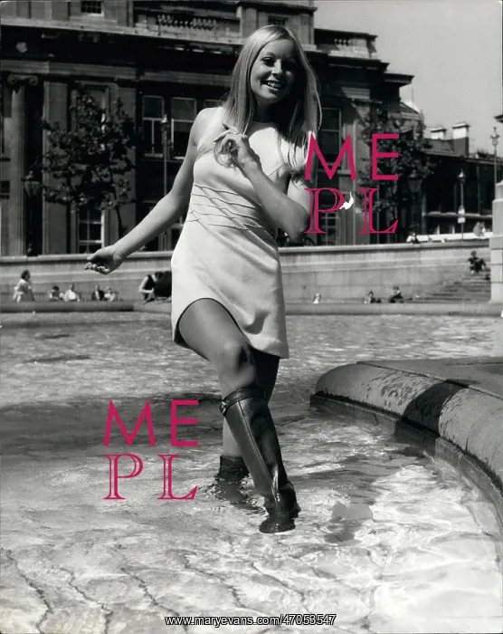 : Model demonstrates waterproof leather boots, London : Model demonstrates waterproof leather boots, London