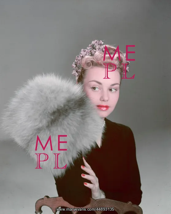 : MODEL WITH FUR MUFF : MODEL WITH FUR MUFF