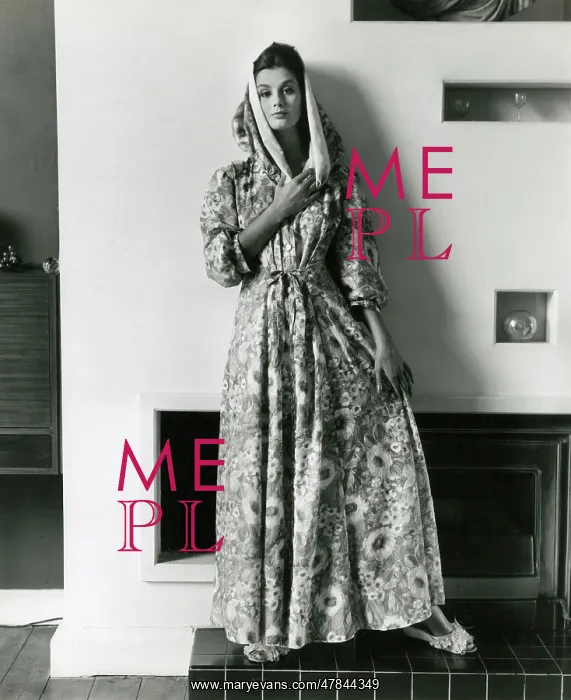 : Model in interior setting, floral dressing gown and slippers : Model in interior setting, floral dressing gown and slippers