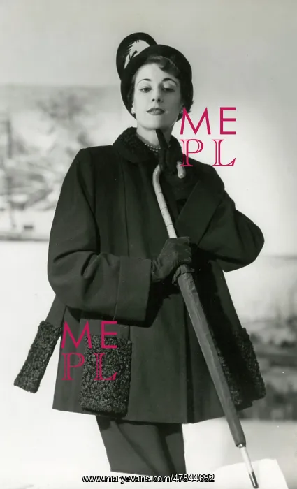 : Model in smart black coat, fancy coat and umbrella : Model in smart black coat, fancy coat and umbrella