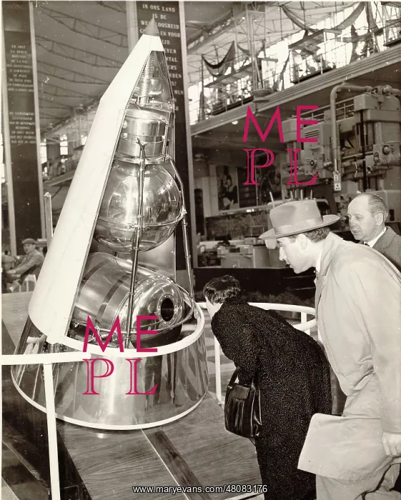 : A model of Sputnik II in the Soviet Pavilion at the Brussels : A model of Sputnik II in the Soviet Pavilion at the Brussels