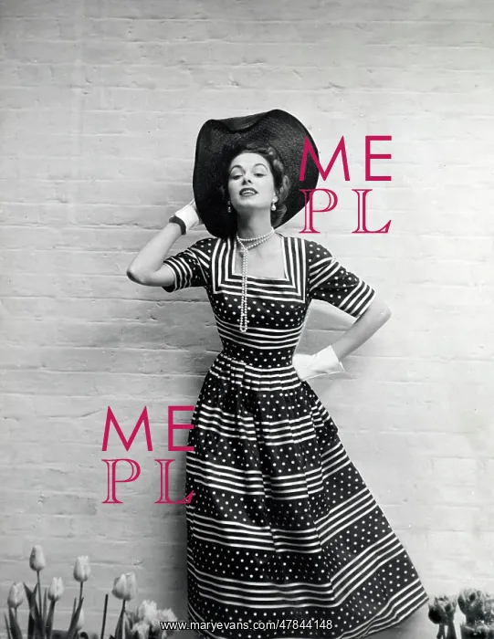 : Model in a summer dress with a stripe and dot pattern : Model in a summer dress with a stripe and dot pattern