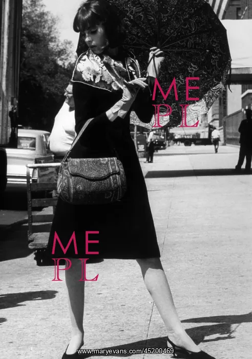: Model wearing a scarf by Sally Gee, bag ? : Model wearing a scarf by Sally Gee, bag ?