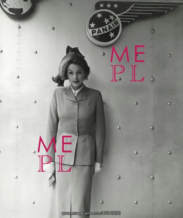 : Model wearing a very smart two-piece travelling suit : Model wearing a very smart two-piece travelling suit