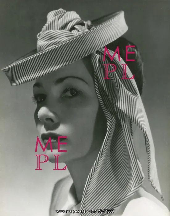 : Model wearing a thin stripe circular hat or fascinator : Model wearing a thin stripe circular hat or fascinator
