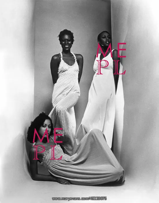 : Three models sport maxi-dresses with empire ? : Three models sport maxi-dresses with empire ?