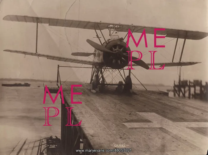 : A much modified Sopwith F1 Camel on a lighter : A much modified Sopwith F1 Camel on a lighter
