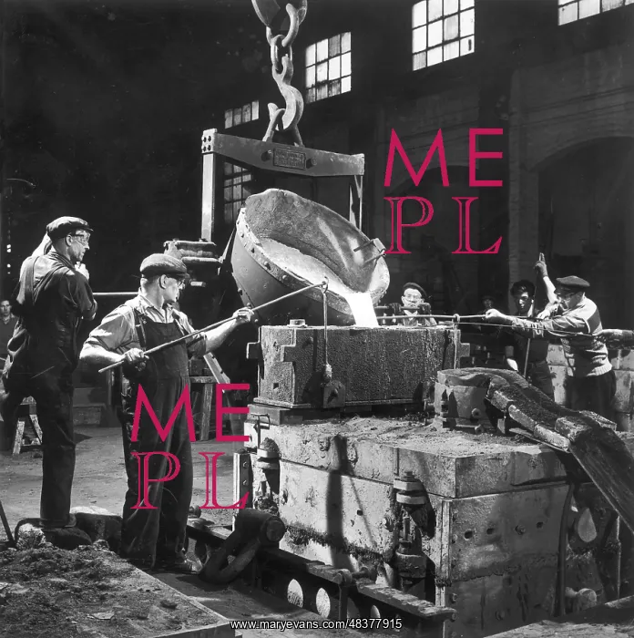 : Molten metal poured into a mould : Molten metal poured into a mould