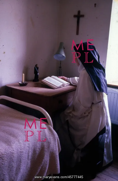 : Monastic life - nun reading in her cell : Monastic life - nun reading in her cell