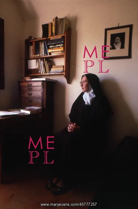 : Monastic life - nun sitting in contemplation : Monastic life - nun sitting in contemplation