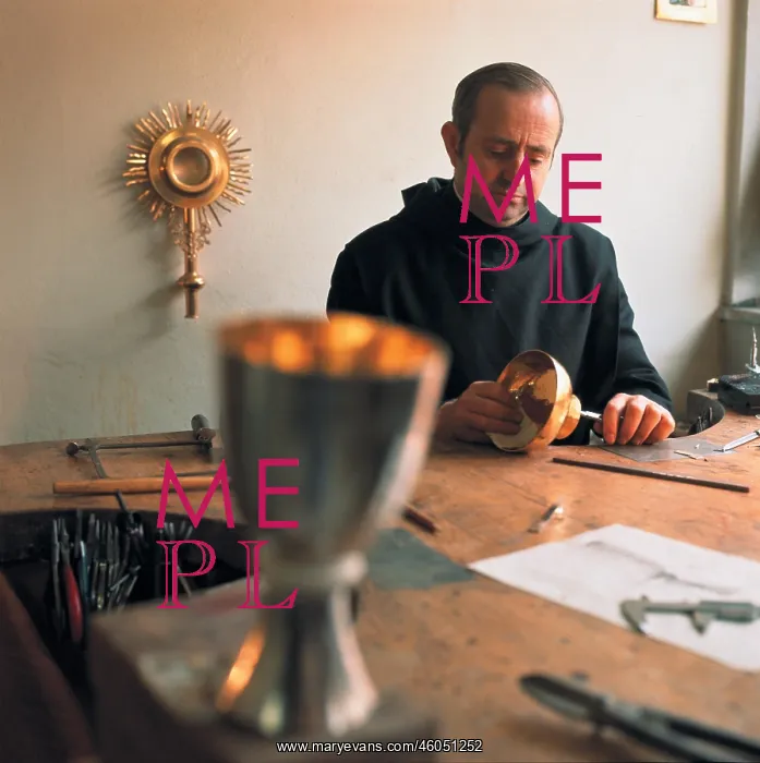 : Monk while crafting a goblet : Monk while crafting a goblet