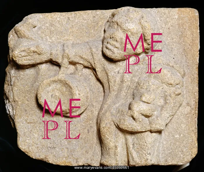 : Monk K. Muchelney Abbey, Somerset. Carved stone on display depicting a monk carrying items : Monk K. Muchelney Abbey, Somerset. Carved stone on display depicting a monk carrying items