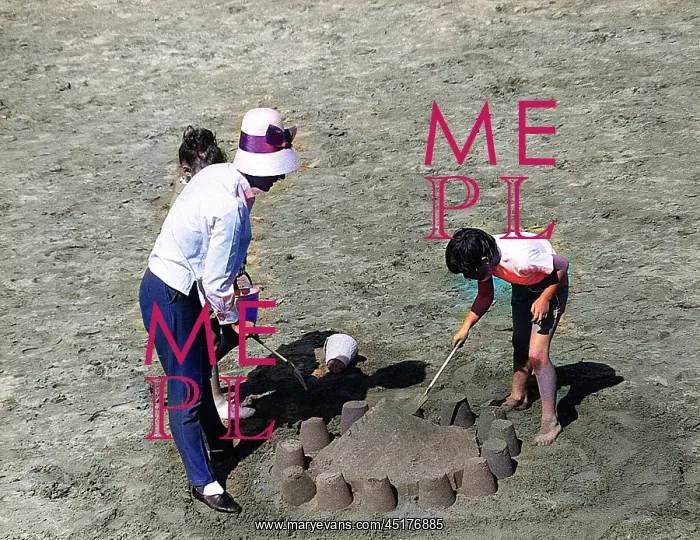  : Mother and children making sandcastle