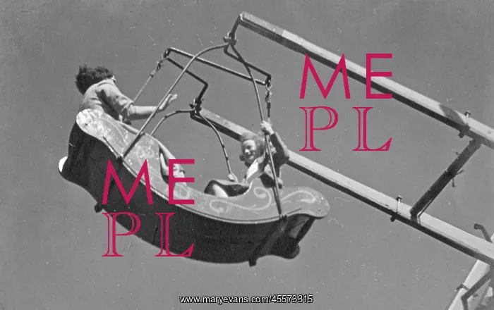 : Mother and daughter on a fairground ride : Mother and daughter on a fairground ride