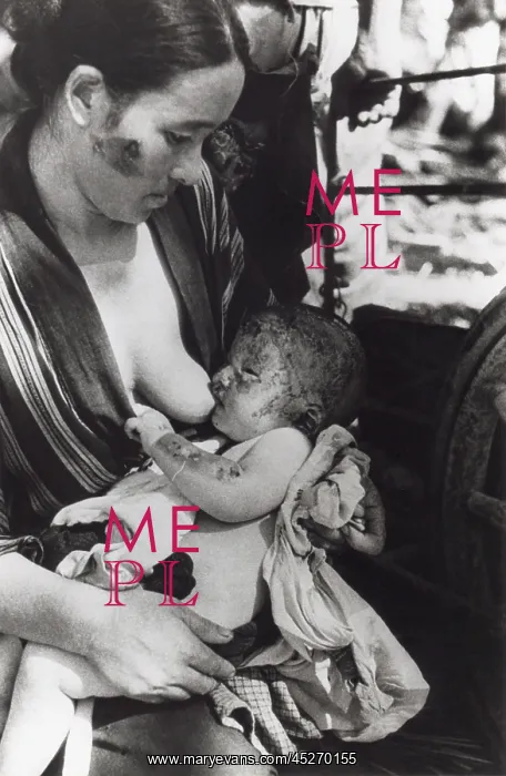 : Mother nursing her baby after surviving of the : Mother nursing her baby after surviving of the
