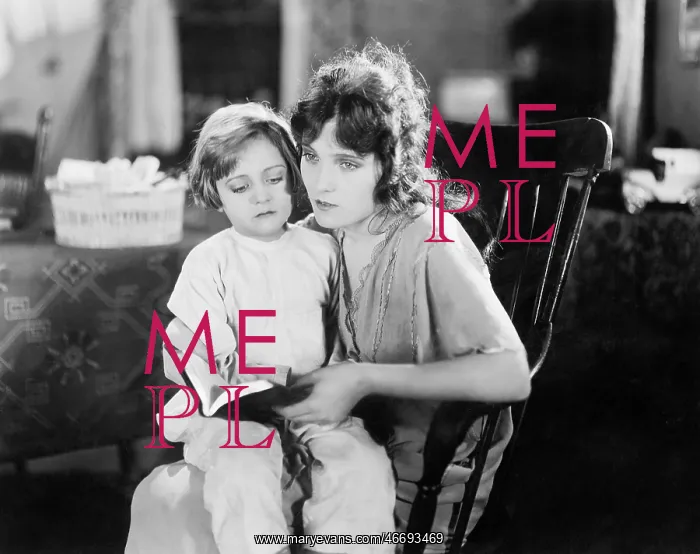 : Mother reading to her daughter : Mother reading to her daughter