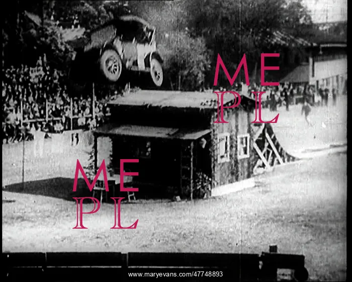 : A Motorcar Jumping Over A Wooden Shack : A Motorcar Jumping Over A Wooden Shack