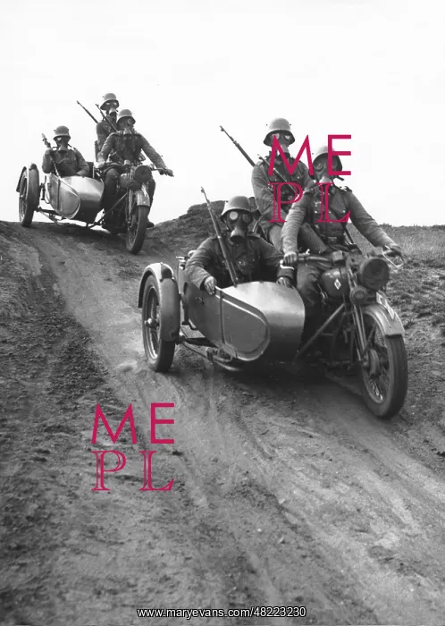 : Motorcycle rifleman during a training ride, 1935 : Motorcycle rifleman during a training ride, 1935