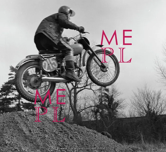 : Motorcyclist taking off into the air : Motorcyclist taking off into the air