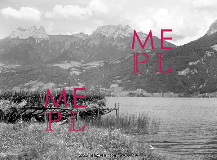 : Mountain backdrop to a lake near Albertville : Mountain backdrop to a lake near Albertville